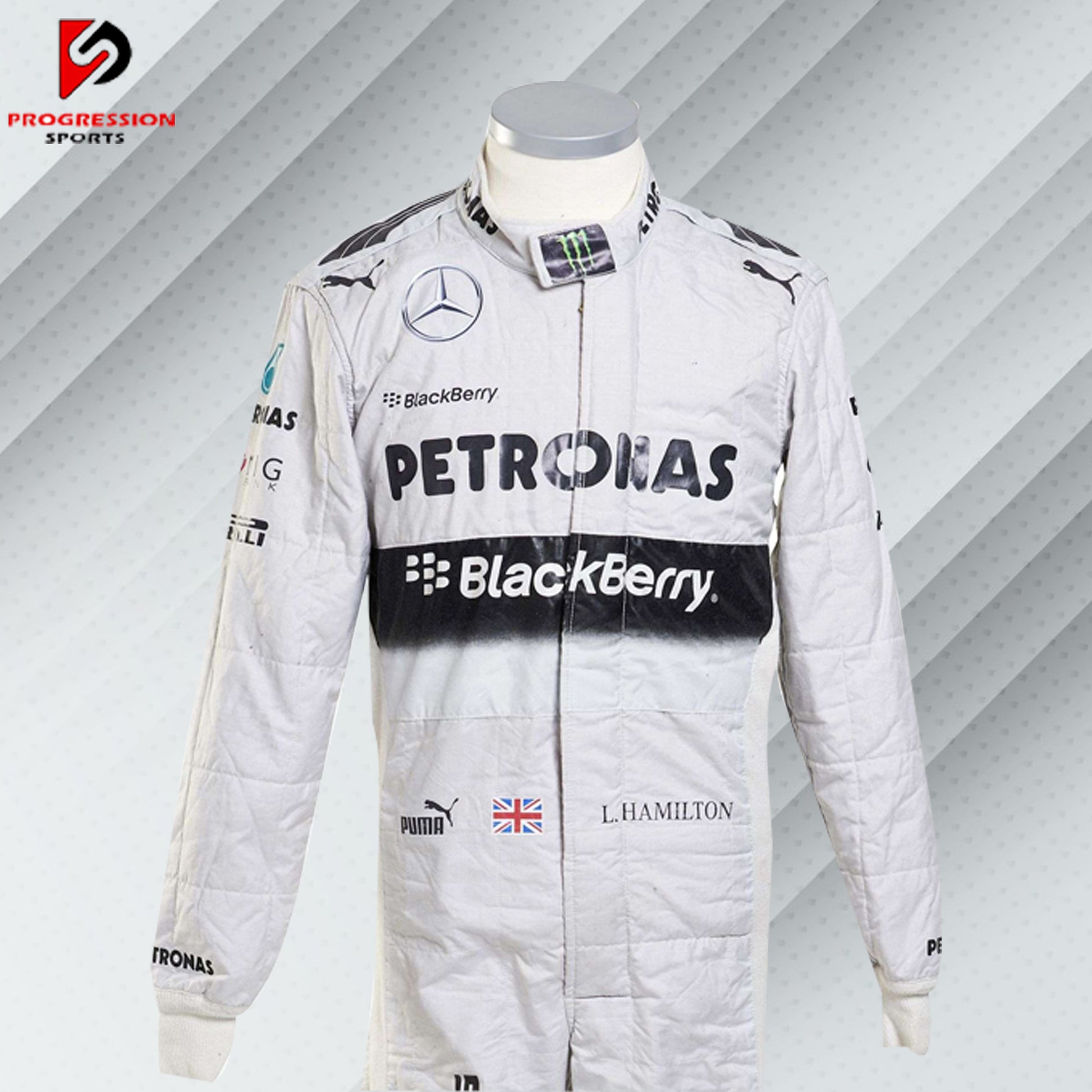 Experience the precision and excellence of Formula 1 with the 2014 Mercedes F1 racing suit. This suit represents a year of dominance for Mercedes in the racing world, combining cutting-edge technology with unparalleled design. Perfect for collectors and F1 enthusiasts, it captures the spirit of a championship-winning team. Own a piece of racing history and feel the legacy of Mercedes.