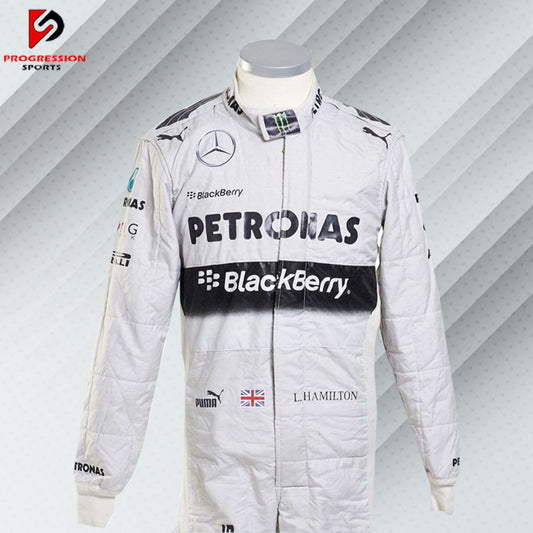 Experience the precision and excellence of Formula 1 with the 2014 Mercedes F1 racing suit. This suit represents a year of dominance for Mercedes in the racing world, combining cutting-edge technology with unparalleled design. Perfect for collectors and F1 enthusiasts, it captures the spirit of a championship-winning team. Own a piece of racing history and feel the legacy of Mercedes.