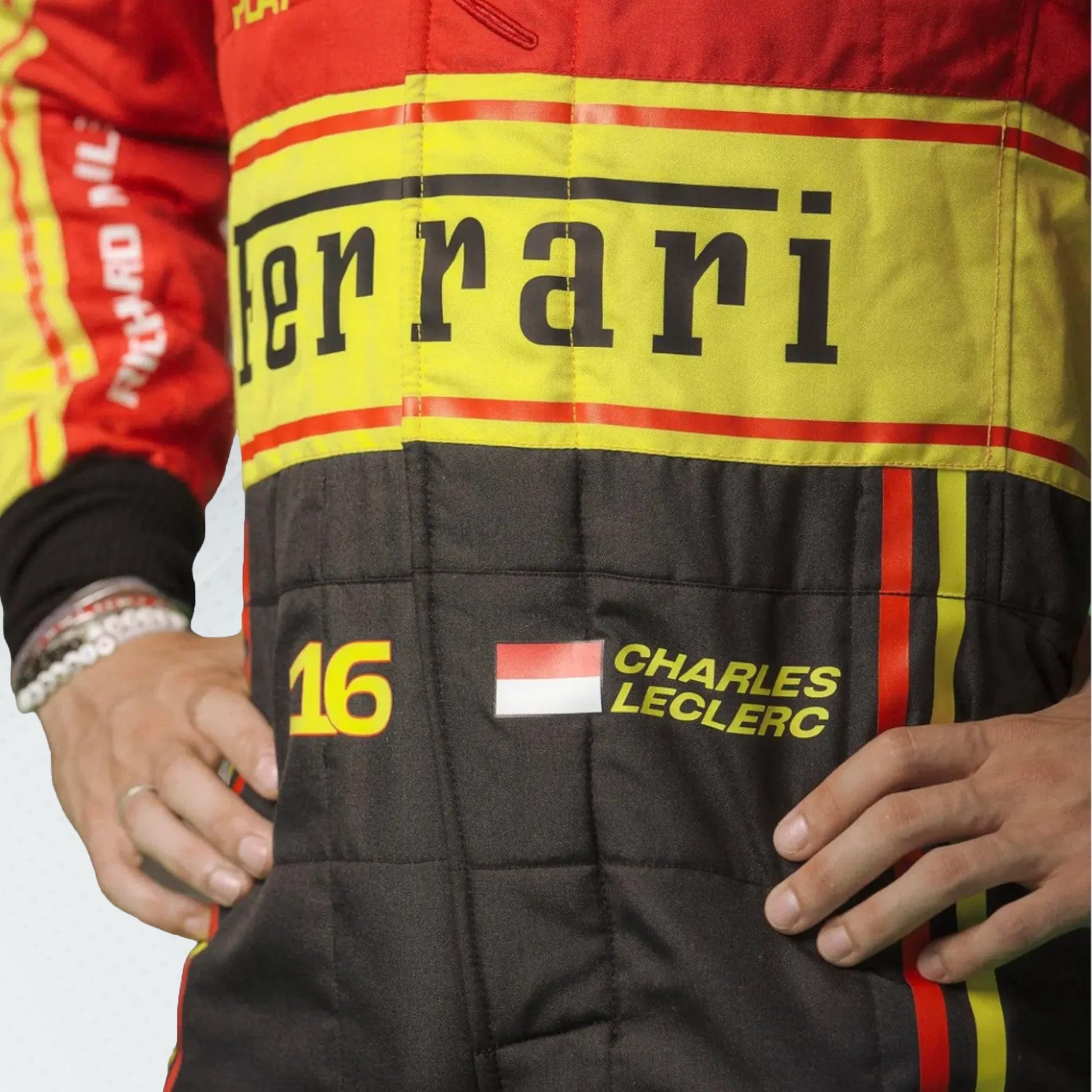 Experience the pinnacle of Formula 1 with the 2023 Scuderia Ferrari F1 racing suit. This suit combines Ferrari's storied tradition of excellence with cutting-edge design and technology, reflecting a dynamic season of performance and innovation. Perfect for collectors and fans, it represents the continued legacy and competitive spirit of Ferrari in 2023. Own a piece of racing history and celebrate the iconic Scuderia Ferrari team.