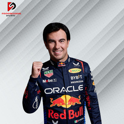 The 2024 Red Bull F1 racing suit is a vibrant blend of navy blue and bold red, with dynamic yellow accents. Made from cutting-edge, flame-resistant materials, it provides exceptional safety and comfort. The suit is emblazoned with Red Bull and key sponsor logos, capturing the energy and competitive spirit of the team.