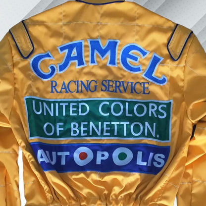 In 1992, Michael Schumacher appeared in F1 kit, sporting the Benetton Ford colours, its brightest shades of green, blue, and yellow, accompanied by a plethora of sponsors on the body. Once more the bodywork was named after Michael Schumacher. By this shirt we would like to let people taste the early days of the times of Michael Schumacher in Formula 1.