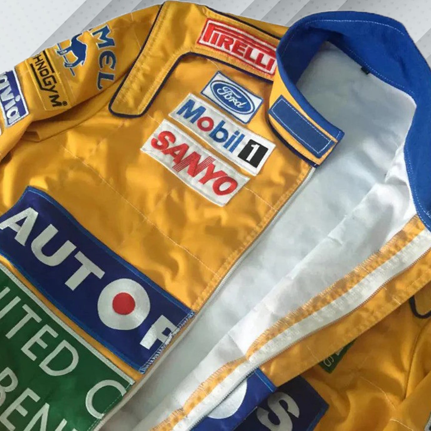 In 1992, Michael Schumacher appeared in F1 kit, sporting the Benetton Ford colours, its brightest shades of green, blue, and yellow, accompanied by a plethora of sponsors on the body. Once more the bodywork was named after Michael Schumacher. By this shirt we would like to let people taste the early days of the times of Michael Schumacher in Formula 1.