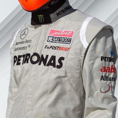 2011 Michael Schumacher Silver  Mercedes Benz F1 race suit, embroidered with Mercedes-Benz and Petronas logos on the full name and detailed branding of the sponsors on his comeback season to Mercedes.