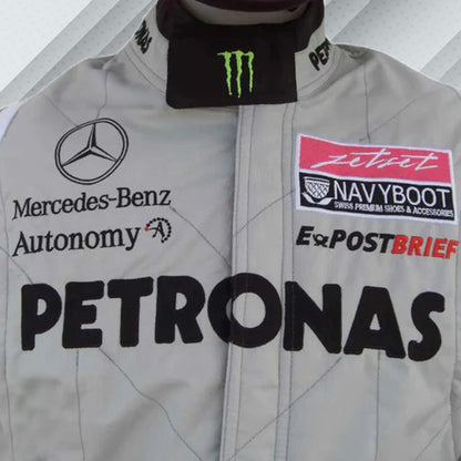 2011 Michael Schumacher Silver  Mercedes Benz F1 race suit, embroidered with Mercedes-Benz and Petronas logos on the full name and detailed branding of the sponsors on his comeback season to Mercedes.