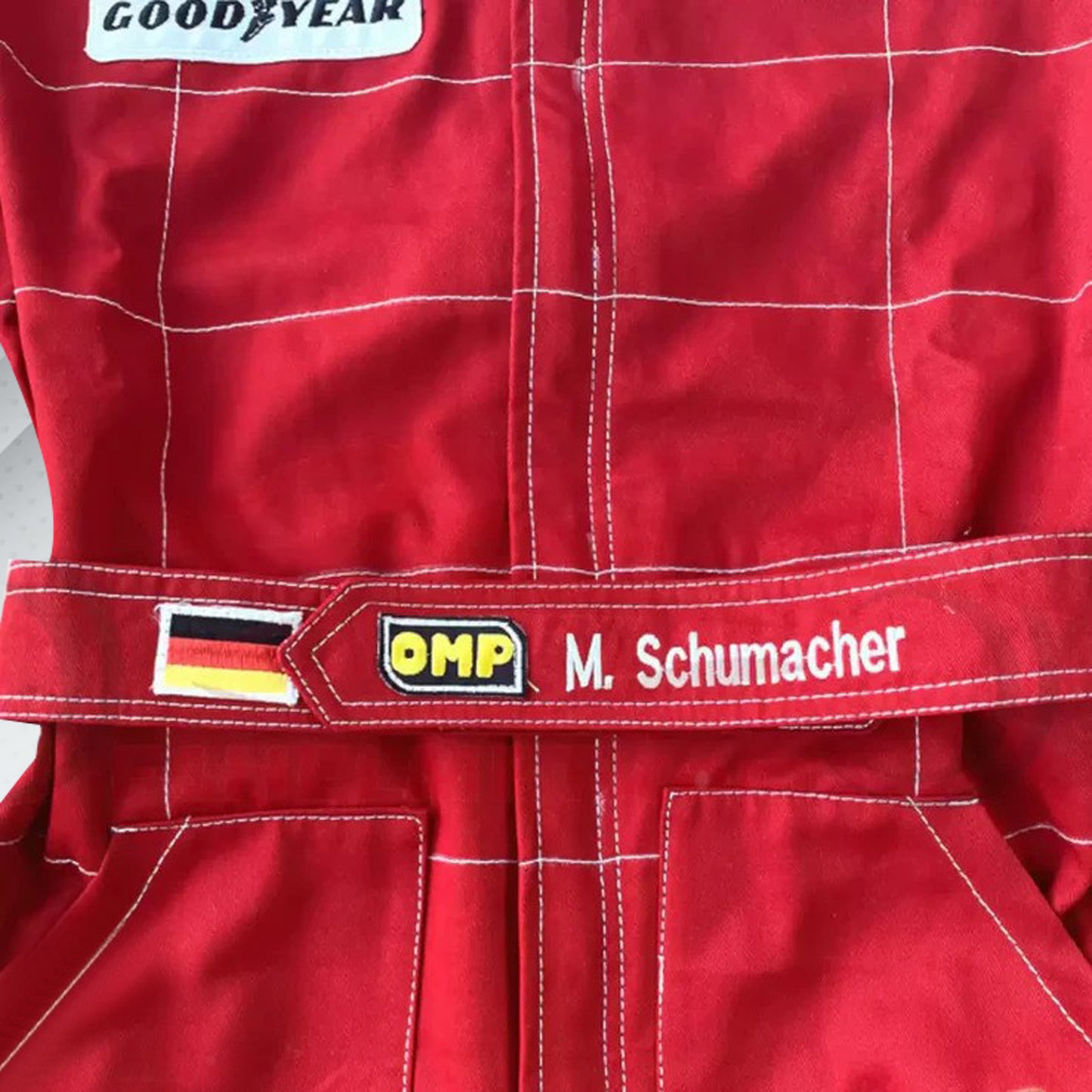 Michael Schumacher 1996 Marlboro F1 vintage embroidered racing suit, classic Marlboro red with Ferrari and Shell sponsor logos and the name is fully embroidered in detailing stitching, which marks his first season of racing for Go-Kart.