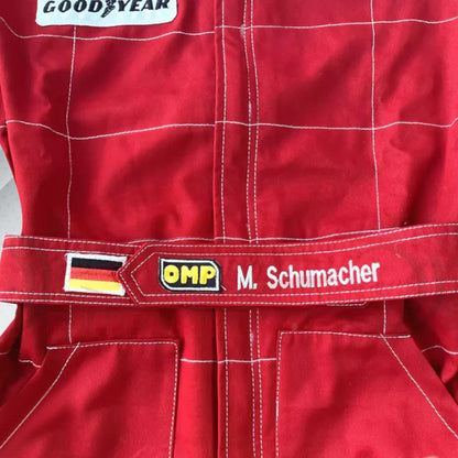 Michael Schumacher 1996 Marlboro F1 vintage embroidered racing suit, classic Marlboro red with Ferrari and Shell sponsor logos and the name is fully embroidered in detailing stitching, which marks his first season of racing for Go-Kart.