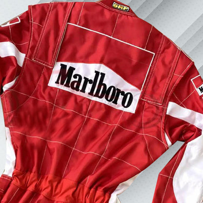 2006 Michael Schumacher Ferrari F1 embroidered racing suit in Ferrari red, showing off this matching logos including Marlboro and Shell. This apparel also carries Schumacher's name and fine stitching to symbolize the final season he spent with Ferrari before retiring.